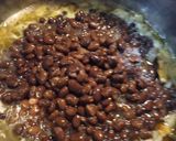 A picture of step 1 of Black Beans with Vinegar-Butter, Poached Onion.