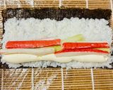 A picture of step 4 of Two types of rolls with crab sticks.