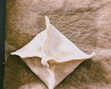 A picture of step 4 of "Samsa" or Samosa with chicken.