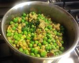 A picture of step 4 of A green koottu with Mung, green peas, and kale.
