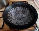A picture of step 1 of Tawa Bhindi.