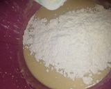 A picture of step 2 of Vanilla cream filled doughnuts.
