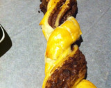 Foto del paso 8 de la receta: Trenza de hojaldre con nutella y chispas de chocolate