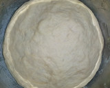 A picture of step 2 of Triangle shaped stuffed bread.