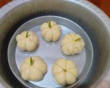 A picture of step 5 of Pumpkin style stuff buns.