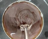 A picture of step 1 of Tiramisu with whipping cream.