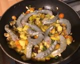 Une image de l'étape 11 de Gambas géantes à l'ananas, aubergine et tomates cerises.