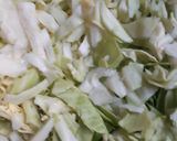 A picture of step 1 of Sabzi of cauliflower and peas.