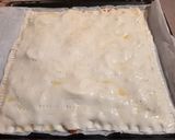 Foto del paso 5 de la receta: Coca de hojaldre con pisto, atún, huevo y melva