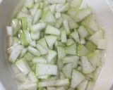 A picture of step 1 of Lauki coconut masala.
