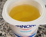 Foto del paso 1 de la receta: Magdalenas de Naranja en thermomix,en un plis plas,las medidas se hacen con el vaso de yogurt vacío