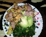 A picture of step 10 of Fried nduma with beef and potato served. with spinach.