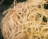 A picture of step 4 of Chicken with Worcestershire Sauce Stir-Fry on Maitake Mushrooms and Bean Sprouts.