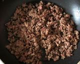 A picture of step 3 of Garganelli with Béchamel and Sausage.