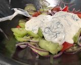 A picture of step 3 of Creamy Cucumber and Tomato Salad.