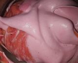 A picture of step 5 of Strawberry milk cake with whipped cream frosting.