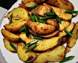 A picture of step 5 of Baked herb potato wedges#weeklyjikonichallenge.