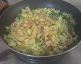 A picture of step 7 of Potato Fried Rice With Onion Rings.