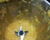 A picture of step 2 of Mango Thandai Shake with ice cream.
