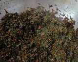 A picture of step 3 of Lal Saag Bhaja/Amaranth.
