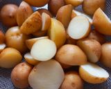 A picture of step 3 of Crispy cheese potato (baby potato with cornflour).