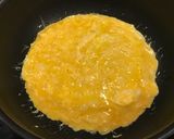 A picture of step 19 of Fluffy and Creamy Omurice with Demi-Glace Sauce.