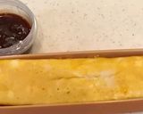 A picture of step 24 of Fluffy and Creamy Omurice with Demi-Glace Sauce.