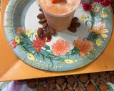 A picture of step 3 of Kesar mango ice cream shake.