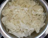 A picture of step 1 of Potato Lachha.