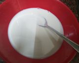 A picture of step 2 of Black current creamy icecream.