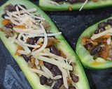 Foto del paso 5 de la receta: Zapallitos rellenos con porotos negros