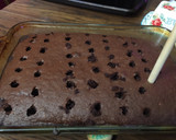 A picture of step 2 of Cookies and cream poke cake.