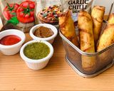 A picture of step 5 of Chicken and vegetable spring roll.