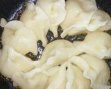 A picture of step 4 of Easy Crispy Pan-Fried Dumplings Using Store-Bought Frozen Dumplings.