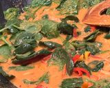 A picture of step 7 of Thai coconut curry with prawns.