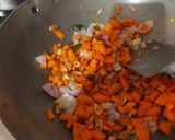 A picture of step 2 of Carrot Daliya.