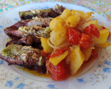 Foto del paso 7 de la receta: Calamares al ajillo, con patatas al horno