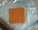 A picture of step 9 of Kesar Pista Coconut Rolls.