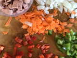 Arroz con verduras y salchichas Frankfurt