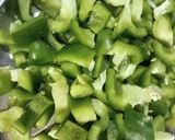 A picture of step 1 of Aloo shimla mirch ki sabji.