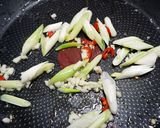 A picture of step 2 of Savory and Spicy Stir-Fried Chicken with Scallions.