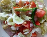 A picture of step 3 of Cauliflower, carrot and potato/ veg/ with salad and chapati.