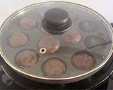 A picture of step 12 of Healthy Atta Jaggery Muffins in Appe Pan.