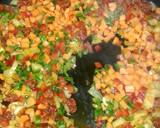 Foto del paso 4 de la receta: Paella con alitas de pollo y chorizo de sarta
