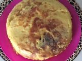 Tortillica de patata rellena de jamón y queso al ajillo
