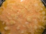 Tortillica de patata rellena de jamón y queso al ajillo