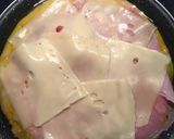 Foto del paso 3 de la receta: Tortillica de patata rellena de jamón y queso al ajillo
