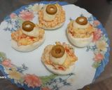 Foto del paso 5 de la receta Huevos rellenos de langostinos y surimi
