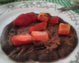 Foto del paso 4 de la receta Tortitas de plátano, avena y cacao con fresas