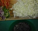 Foto langkah ke 1 dari resep Nasi Goreng Cumi Hitam Simpel.